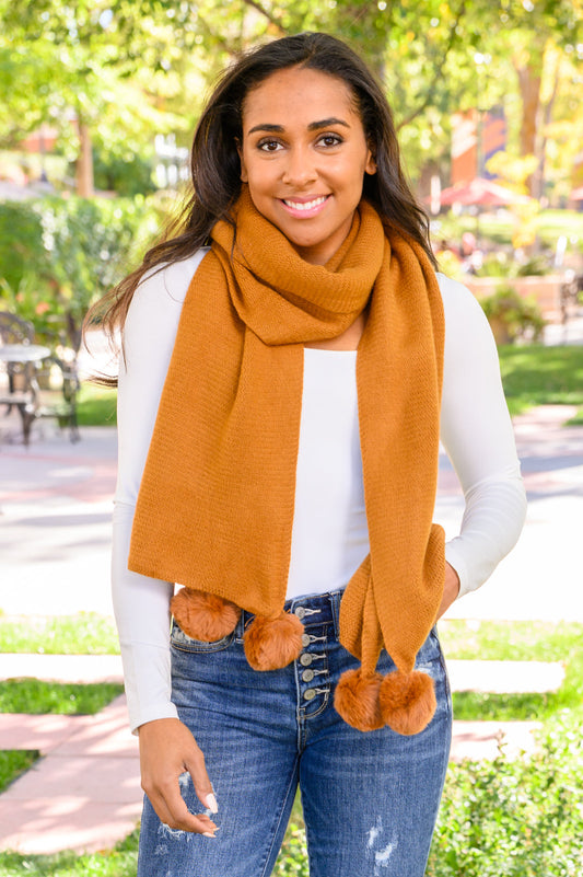 Knitted Fuzzy Pom Pom Scarf In Ginger